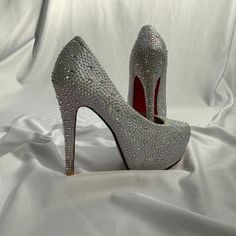 Women's White And Silver High Heels. Over 4 Inches In Height. Waterproof Platform. Great As A Bridal Or Wedding Shoe. Nwot But In Excellent Condition. Only Worn Once. Size 6.5 Luxury Silver-tone Heels For Formal Occasions, Glamorous Silver Wedding Shoes With 4-inch Heel, Silver Ankle-high Heels With Reinforced Heel, Luxury Silver Wedding Shoes With 4-inch Heel, Glamorous Metallic Silver Heels With 4-inch Heel, Rhinestone High Heels, Silver High Heels, Shoe Boutique, Ladies Boutique