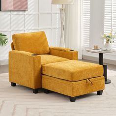 a yellow chair and ottoman in a living room