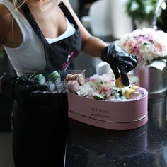 Flowers in a box and macaroons - the perfect combination that will please not only the pleasant aroma of flowers but also the pleasant taste of macaroons. Macaroons are placed by a florist in disposable sterile gloves and a mask. The sweets are of the highest quality and brought to our store every morning. A good gift for birthday, sweetheart, wife, friend or as a compliment for any occasion. Delivery is possible same day or by pickup at your request. The box is filled with roses, eustoms, lisia Gift Baskets For Her With Flowers, Luxury Flowers Set, Homemade Macaroons, Macaron Gift Boxes, Valentines Balloons Bouquet, Flowers In A Box, White Anemones, Pink Clover, Valentines Balloons