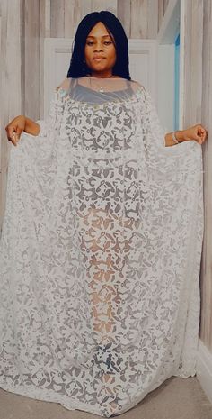 A beautiful Abaya/Boubou/Kaftan dress for all occassion. The dress have detail sparkling beads round the chest and  back which gives it lovely glow, it is stretchy and would fit a size 12/14/16. you would love it. Cape Dresses For Evening Eid Celebrations, White Maxi Length Thobe For Party, Evening Cape Dress For Eid, Summer Wedding Floor-length Abaya, Elegant Long Abaya For Vacation, Cape Dresses For Eid Party, Elegant Beach Maxi Dress For Eid, Elegant Maxi Dress For Beach And Eid, White Long Abaya For Party