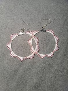 Pink and white hoop beaded earings diameter 2 in. Hypoallergenic stirling silver hooks Nickel-free Summer Jewelry, White Metal Round Hoop Earrings, Summer Jewelry With Dangling Round Beads, Summer Round Jewelry With Dangling Beads, Nickel-free Small Hoop Beaded Earrings For Summer, Beaded Round Earrings For Summer, Silver Beaded Earrings With Colorful Beads, Round Beaded Summer Earrings, Silver Round Beaded Earrings With Colorful Beads