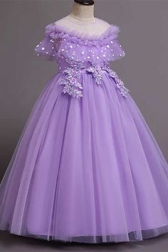 Modsele purple tulle girl birthday dress features sheer rounded neck, ruffled sleeves, appliques, and A-line tutu-style skirt. Hidden zipper back. Product Details:  SKU:PD2152 Tulle material Full length Size chart:      Size(cm) Bust(cm) Waist(cm)   Skirt length(cm)   120 64  60  92    130 68 64  99    140 72 68  106    150 76 72  113    160 80 76  120    170 90 86  127      Note: Our dresses are inelastic, it will be perfect that select size more than 3cm based on personal measures.  Our child Purple Floral Applique Princess Dress For Dress-up, Purple Princess Dress With Floral Applique For Parties, Purple Tulle Dress With Ruffles, Purple Princess Dress With Floral Applique, Purple Floral Applique Princess Dress For Wedding, Purple Princess Dress With Floral Applique For Wedding, Purple Ball Gown Princess Dress For Party, Purple Floral Applique Party Dress, Purple Party Dress With Floral Applique