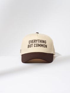 You’re far from common and people need to know that. Our Everything But Common Trucker Hat is just the accessory you need. Coming in a two-tone brown and tan colorway and a two-tone charcoal and tan colorway, this snapback hat will go with any look you’re putting together. For more embroidered trucker hats, shop our full apparel line. Everyday Adjustable Brown Trucker Hat, Brown Trucker Cap For Everyday, Trendy Brown Trucker Hat For Streetwear, Beige Snapback Dad Hat For Everyday, Brown 5-panel Hat For Everyday Wear, Brown Curved Brim Trucker Hat For Streetwear, Brown Flat Bill Trucker Hat For Everyday, Brown Snapback Dad Hat For Streetwear, Beige Snapback Baseball Cap For Everyday