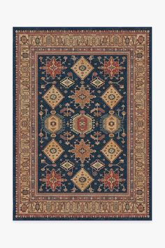 a blue rug with an intricate design on the front and back side, in various colors