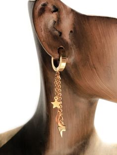 These dangly statement earrings are a fashionable huggie hoop with three chains each with a charm at the end- one star, one crescent moon & one lightning bolt. Huggie hoops are hinged at the bottom of the hoop and snap to clasp. Choose from silver or gold plated stainless steel (hypoallergenic). Hoop is 1/2" long with a total length of 2". One Star, Lightning Bolt, Crescent Moon, Septum Ring, Crescent, Statement Earrings, Gold Plate, Nose Ring, Plating