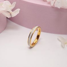 The current production time is 10 to 15 business days from the moment we receive your breastmilk sample.  Welcome to the heartwarming world of our Breastmilk Inlay Ring, where every piece tells a tale of motherhood's gentle embrace. Crafted with devotion robust tungsten carbide this ring serves as a precious keepsake that captures the essence of your unique journey with your child. Material Options: Durable Tungsten Carbide gold plated or rose gold plated Personal Touches: Beautifully set with a Breast Milk Ring, Breastmilk Ring, Breastmilk Jewelry, Gold Rings Simple, Tungsten Carbide Rings, Tungsten Carbide, Breast Milk, Anniversary Bands, Selling Jewelry