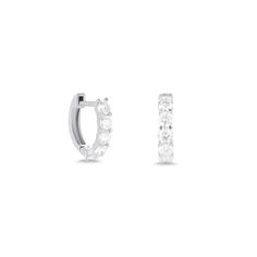 Design Our classic huggie style with extra large diamonds. To be worn when you're feelin' extra. Details & Dimensions - 0.70 carats (pair), 0.35 carats (single)- Exterior Measurements: 11mm width, 9.5mm height- Interior Measurements: 6.5mm width, 7mm height Classic Hoop Earrings With Single Cut Diamonds, Timeless Brilliant Cut Huggie Earrings For Formal Events, Timeless Brilliant Cut Huggie Earrings For Formal Occasions, Classic Formal Huggie Earrings With Single Cut Diamonds, Timeless Huggie Earrings With Prong Setting For Formal Occasions, Classic Brilliant Cut Huggie Earrings For Everyday, Everyday Classic Brilliant Cut Huggie Earrings, Formal Brilliant Cut Round Huggie Earrings, Classic Huggie Earrings For Wedding