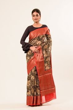 Black Kalamkari Cotton Silk Saree with Red Border - Anvi Couture Red Cotton Silk Pre-draped Saree For Designer Wear, Red Tussar Silk Designer Pre-draped Saree, Red Tussar Silk Pre-draped Designer Saree, Red Cotton Silk Pre-draped Saree With Cutdana, Traditional Red Saree With Printed Border, Fitted Red Kalamkari Print Saree, Unstitched Red Traditional Wear With Printed Border, Red Art Silk Saree With Printed Border, Red Saree With Printed Border