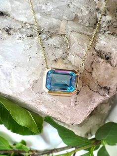 This graceful London Blue Topaz necklace is set in 14kt Yellow Gold for a luxurious look. The bezel setting allows the stone to be securely held, making it a timeless piece to treasure. This necklace features:-1.50 carat London Blue Topaz-Bezel Setting-14KT Yellow Gold -16-18 in. adjustable chainStyle #235-00111 Earrings Not Included Luxury Faceted Blue Topaz Necklace, Heirloom Luxury Topaz Ring With Bezel Setting, Luxury Blue Topaz Jewelry With Pave Setting, Luxury Timeless Topaz Ring, Luxury Hallmarked Blue Topaz Jewelry, Luxury Diamond Cut Topaz Necklace, Luxury Topaz Jewelry With Gemstone Accents, Luxury Faceted Topaz Jewelry, Luxury Antique Topaz Jewelry