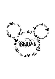 mickey mouse ears with the words believe on it in black and white lettering, surrounded by leaves