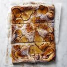 four slices of apple pie on a piece of parchment paper