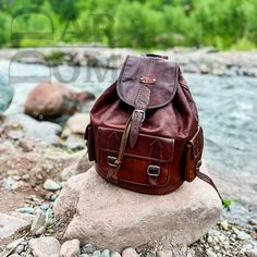 Moroccan Leather Backpack Vintage Leather Backpack Handmade Backpack Brown Backpack ## Product Characteristics ## -Dimension : (13.77H * 11.41W)inch  [35 cm H * 29 cm W ] -Color : Dark Brown -Material: 100 % Goat leather -100% Handmade - This backpack is handcrafted from high quality goat leather. The leather we use is treated with natural materials that make the leather has no unpleasant smell. This backpack is the best choice for your travels, because it is very durable and can withstand heavy weights. ##Note ## We still need your phone number for the shipping company can you please send it! Leather Backpack For Outdoor, Leather Shoulder Bag Backpack For Outdoor, Leather Casual Satchel Backpack, Leather Backpack Shoulder Bag For Outdoor, Large Capacity Leather Backpack Satchel, Leather Satchel Backpack With Large Capacity, Casual Satchel With Leather Backing, Outdoor Leather Standard Backpack, Outdoor Satchel Backpack With Leather Lining