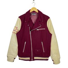 In The Attic Double Collar Varsity Jacket Maroon Size Large * Made in : China * Size on Tag : L (large) * Manual Measurement (inch) : Chest 21.5, Length 26.5, Shoulder 17.5, Sleeve 25.5, Hem 19.5. * Recommended for Size : Large (L) * Material : Wool Polyester PVC * Colour : Maroon * Condition : Very Worn with several stain and scratch. * See photos for details. 3005 Retro Fall Outerwear For Streetwear, Retro Patchwork Outerwear For College, Retro Brown Varsity Jacket With Long Sleeves, Retro Fall Track Jacket For Streetwear, Retro Brown Varsity Jacket, Fall Varsity Long Sleeve Track Jacket, Varsity Long Sleeve Track Jacket For Fall, Fall Varsity Track Jacket With Long Sleeves, Red Varsity Outerwear With Patchwork