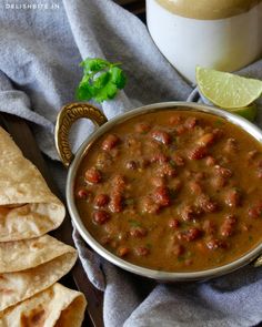 a bowl filled with beans and tortilla chips