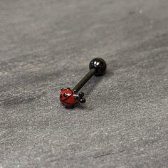 Black Classic Ladybug Top End Barbell Tongue Ring - Surgical Grade Stainless Steel - Body Candy Cool Tongue Rings, Tongue Piercing Jewelry, Tongue Ring, Piercing Inspo, The Ladybug, A Ladybug, Cute Engagement Rings, Tongue Piercing, Tongue Rings