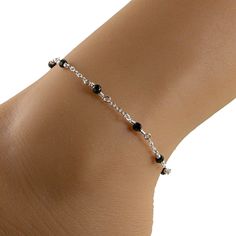 black crystal silver chain anklet Silver Black Beads Anklets, Elegant Black Bracelets With Silver Chain, Elegant Black Bracelet With Silver Chain, Elegant Black Beaded Anklets, Anklets Black, Payal Designs Silver, Black Anklet, Elegant Anklet, Silver Chain Anklet