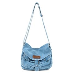 PRICES MAY VARY. Stylish and Durable: The crossbody bag is made of denim fabric, which not only adds a fashionable touch but also ensures its durability. It can withstand daily wear and tear, making it a long-lasting accessory. Practical and Organized: Size--12.6*3.1*10.2(L*W*H). The denim bag is designed with functionality in mind. It allows you to keep your belongings organized and easily accessible. The main compartment is spacious enough to hold larger items, while the 2 front snap pockets a Denim Cross Body Bag, Cheap Denim Shoulder Bag, Cheap Denim Blue Canvas Shoulder Bag, Jean Messenger Bag, Cheap Handmade Denim Shoulder Bag, Denim Bags, Everyday Blue Recycled Denim Shoulder Bag, Blue Recycled Denim Shoulder Bag With Zipper Pocket, Cute Crossbody Bags