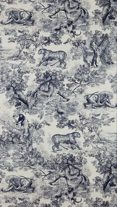 a blue and white wallpaper with animals on it