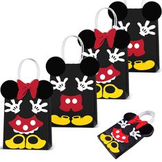 four mickey mouse bags with red and yellow bows are shown in three different designs, one is