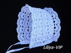 a white crochet doily on a black background with the words luya - vip written below it