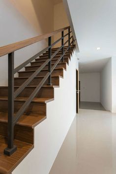 the stairs are made of wood and metal