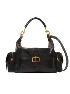 Chloé's Large Camera bag is crafted from natural shiny buffalo leather. Its multiple pockets are embellished with revamped buckles from the iconic Paddington bag. Carry the Camera bag in the hand, on the shoulder or cross-body with the handles or strap. Product Details Designer ID: CHC24AS532N83001 Color: Black Composition: Main material: Buffalo leather; Flap lining: Buffalo leather; Main lining: 54% Cotton, 46% Linen Width: 16.9" (43 cm); Height: 7.9" (20 cm); Depth: 8.3" (21 cm); Handle drop: Paddington Bag, Chloe Shoulder Bag, Sneaker Jewelry, Buffalo Leather, Black Shoulder Bag, Chloe Bag, Basket Bag, Fall 2024, Small Leather Goods