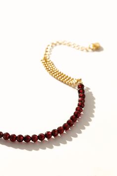 Ruby Woven Gold Bracelet - Artsory Gold Beaded Bracelet With Polished Beads For Parties, Gold Beaded Bracelets With Polished Beads For Party, Gold Polished Beads Bracelets For Party, Party Gold Beaded Bracelets With Polished Beads, Elegant Beaded Chain Bracelets For Party, Elegant Party Bracelets With Beaded Chain, Elegant Gold Beaded Bracelets With Faceted Details, Beaded Chain Bracelet With Round Beads For Party, Gold Crystal Bracelet With Round Beads And Beaded Chain