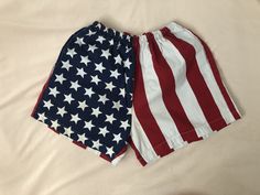 "Super cool USA flag shorts!!  Measurements (laying flat)... Waist: 12-17.5\" Hips: 25.5\" Rise: 12.5\" Inseam: 4\" Leg opening: 14\" Some yellowing around the waist - can be washed out - maybe pre-treat" Beach Shorts With Flag Print, Patriotic American Flag Print Shorts For Beach, American Flag Cotton Bottoms For 4th Of July, Short Shorts For 4th Of July Beach Events, Shorts For 4th Of July Beach Events, Patriotic Beach Shorts With American Flag Print, 4th Of July Beach Shorts, Cotton Shorts With Flag Print For Summer, Summer Cotton Shorts With Flag Print