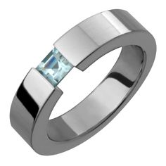 This is a 5mm  titanium & genuine aquamarine tension set ring. It is hand made on a machine. The ring is set with a 4mm genuine square aquamarine. Each ring is made to the customers specifications, meaning the customer can customize the following:  -Ring size -Ring width (certain restrictions apply) -Stone size (certain restrictions apply) -Stone type (certain restrictions apply) -Metal color (black or regular titanium)  -Metal type (certain restrictions apply) -Metal finish (polished, matte, sa Birthstone Wedding Band, Titanium Rings For Men, Aquamarine Birthstone, Titanium Metal, Fashion Rings Silver, Sea Glass Ring, Tension Setting, Titanium Ring, Diamond Engagement Wedding Ring