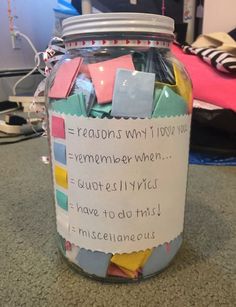 a jar filled with lots of sticky notes