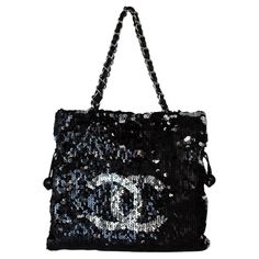 Introducing the Chanel Summer Nights Sequin Drawstring Tote Small SHW, a timeless and fashionable bag for any occasion. This exquisite bag features mesmerising sequins, chain-leather handles, and the iconic CC logo. The drawstring closure reveals a satin interior, spacious for your essentials. Condition: Appearance: B - Good: Regularly used with visible wear and tear, clear scratches, stains, and messy or loose sequins. Please see photos. Inside: AB - Very Good: Clearly used but well-maintained, with light scratches, minor stains, and slight changes in shape. Refer to photos. Part of the 2008-2009 collection, with the unique code 12XXXXXX Chanel Summer, Vintage Chanel Bag, China Dolls, Classic Logo, Cc Logo, Chanel Black, Vintage Chanel, Leather Chain, Chanel Handbags