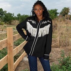 Here's a good ole black cowboy shirt for you ropers. It features white embroidered detail and Fringe. Lordy, lots of it. We've enhanced this fella with a little bling. We know how some of you fellas are and a little can go a long way without being bodacious.  There's only one of this kind, so get a long lil doggie ( dont mind the filly, we just could find a cowpoke)  *Please check your measurements. *Use the zoom feature to inspect the item. Have questions? Ask away using the ask button below the title. We'll get back to you in 12 hours or less. Check out more Buffalo Gal Vintage costumes at the link below https://www.etsy.com/shop/BuffaloGalVintage?ref=seller-platform-mcnav&section_id=30049410 We ship USPS ground. For faster service use Priority Mail.  Thanks for taking a gander at Buffal Ken Cowboy, Rhinestone Cowboy, Cowboy Costume, Cowboy Shirt, Black Cowboy, Cowboys Shirt, Cow Boy, Black Fringe, Western Shirt