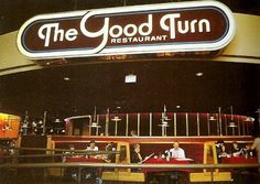 the good turn restaurant is located in an old time shopping mall with people sitting at tables