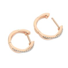 Elevate your style with our Enchanting Twisted Huggie Hoop Earrings. Crafted in 14k gold, these curved lab grown diamond huggie hoops feature a mesmerizing twist design that gracefully hugs your earlobe. A single band adorned with a delicate trail of round diamonds adds a touch of brilliance. Perfect for day-to-night wear, these earrings exude timeless sophistication and effortless charm. It is where sustainable luxury meets elegance. Elegant Tarnish-resistant Rose Gold Huggie Earrings, Elegant 14k Gold-tone Huggie Earrings, Gold Huggie Earrings With Modern Twist, Tarnish Resistant, Elegant Rose Gold 14k Gold-filled Huggie Earrings, Gift Rose Gold 14k Gold-filled Hoop Earrings, Hug You, Huggie Hoop Earrings, Tennis Bracelet, Keepsake Boxes