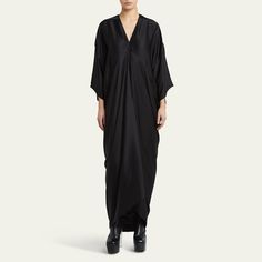 Rick Owens caftan in gathered satin  Approx. 62.2”L from shoulder to hem V neckline Three-quarter sleeves Full length Relaxed silhouette Slip-on closure Viscose/acetate Made in Italy Formal Floor-length Silk Kaftan, Silk Floor-length Kaftan For Formal Occasions, Satin Maxi Length Evening Kaftan, Evening Satin Maxi Kaftan, Evening Satin Maxi Length Kaftan, Long Satin Kaftan For Evening, Silk V-neck Evening Kaftan, Evening Satin Floor-length Kaftan, Silk Kaftan For Evening