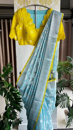 Product Descriptions : Blue pure kota doria embroidered woven saree with detailed embroidery all over saree & zari border, pallu comes with lime yellow kota silk embroidery V neck scalloped blouse View this post on Instagram A post shared by Handcrafted Sarees by Shobana Nithin (@threadslabel_india) Silk Sarees Blouse Designs Latest, Blouse Design For Cotton Silk Saree, Designer Yellow Slub Silk Blouse Piece, Yellow Semi-stitched Cotton Silk Saree, Designer Yellow Slub Silk Pre-draped Saree, Yellow Unstitched Blouse With Cutdana Details, Yellow Unstitched Chanderi Blouse, Unstitched Yellow Chanderi Blouse, Yellow Handloom Blouse With Traditional Drape