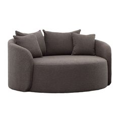 a grey round chair with pillows on the seat and back cushions, in front of a white background