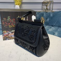 Description DG Medium Sicily Bag In Embroidered Black For Women 10.2in/26cm DG Rep 1:1 Size: 21 x 26 x 12 cm / 8.3 x 10.2 x 4.7 inches (Length x Height x Width) Laser-etched enameled metal plate with logo on the front Top handle and adjustable, detachable strap Storage pocket with zipper featuring a branded slider Metal feet studs on the base Item comes with a branded dust bag Includes dust bag. This product is of the best quality. Sicily Bag, Louis Vuitton Shirt, Chanel Shirt, Soft Bag, Gucci Gg Marmont, Reversible Belt, Evening Clutch Bag, Metal Plate, Girls Bags