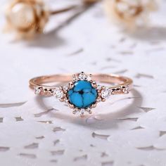 This is 5mm round cut turquoise engagement ring rose gold. The accent stones are VVS man made cz diamond. The stones can be replace with other gemstones.For example,if you don't like the CZ accent,you can ask me replace it with tourmaline,aquamarine,diamond,emerald,sapphire... For custom making jewelry,it can be made in 2 different metal(Please contact me if you need this one made in solid gold). 1,Solid gold,including 14/18k white/rose/yellow gold. 2,925 sterling silver with white/yellow/rose g Gold Turquoise Ring, Turquoise Engagement Ring, Turquoise Ring Engagement, Vintage Turquoise Ring, Turquoise Gold Ring, Engagement Ring Rose Gold, Ring Birthstone, Ring Rose Gold, Rose Engagement Ring