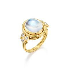 This is the first ring Temple ever made. It finds our signature stone, the Blue Moonstone, in one of our most iconic settings. Flanked by two trios of expertly cut diamonds, The 18K Classic Temple Ring is the ultimate addition to any jewelry collection. Product Details  18K gold Blue Moonstone (6cts) Diamond (0.3cts) W St Claire, Traditional Diamond, Mini Earrings, Moonstone Engagement Ring, Gold Cocktail Ring, Bezel Ring, Blue Moonstone, Gemstone Engagement, Women Diamond