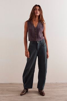 So bold barrel jeans from our We The Free collection featured in a mid-rise fit with subtle distressed detailing and wide-legs that taper at the ankle. **Fit:** Mid-rise, slouchy, relaxed fit, wide-legs, ankle-length; this style runs slightly large so we recommend sizing down one size **Features:** Button closure, rigid denim fabrication, belt loops at waistband, 4-pocket style, subtle distressing, tapered bottom hem, seam detail throughout **Why We | We The Free Good Luck Mid-Rise Barrel Jeans at Free People in Green, Size: 26 S 70s Tomboy Style, Sofi Tukker Style, Barrel Trousers Outfit, No Jeans Outfit Ideas, Green Barrel Pants Outfit, Modern Boho Style, Sally Owens Style, Free People Style Outfits, Barrel Pants