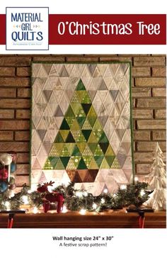 a christmas tree is hanging on the wall next to a mantle with candles and ornaments