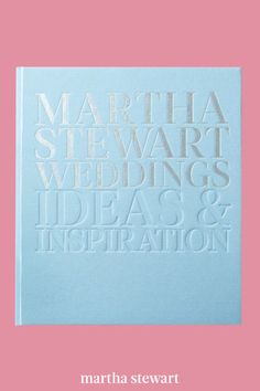 martha stewart's wedding ideas and inspiration book is shown in white on a pink background