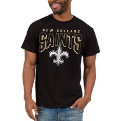 a man wearing a new orleans saints t - shirt