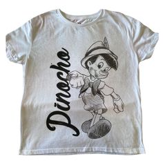 Brand New Original. Disney Pinocho T-Shirt. Disney White Top With Letter Print, White Disney Crew Neck T-shirt, White Short Sleeve Disney T-shirt, Disney White Pre-shrunk T-shirt, White Pre-shrunk Disney T-shirt, Disney Tops, Colorful Shirts, Womens Tops, Tops & Tees