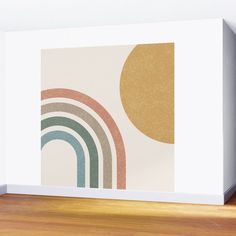 a wall mounted on the side of a room with a rainbow and sun in it