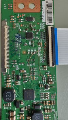 an electronic board with many components attached to it