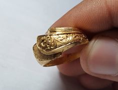 Beautiful handmade Pure Gold handmade Engraved ring by one of our most professional Artist, its and Handmade Artisian so Don't be worry about quality and finish we will take care of it for you. Pure 21k Gold Ring for wedding or engagement also useful for Anniversary Occasions Best Ring for ladies on their beautiful Occasions we care about Flawless Ring Pure gold, Hard shine great polishing would be done by our team mates We can make sizes as per buyer choice Shipping through FedEx as soon as we Antique 22k Gold Wedding Ring, 22k Gold Antique Rings For Ceremonial Occasions, Antique 22k Gold Rings For Ceremonial Occasions, Antique 22k Gold Ceremonial Rings, Yellow Gold Rings With Unique Design For Wedding, Gold Engraved Ring With Intricate Design For Marriage, Handmade 22k Gold Rings For Formal Occasions, Gold Engraved Traditional Ring For Anniversary, Traditional Gold Engraved Ring For Anniversary