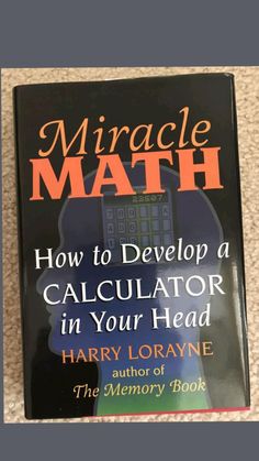 a book on the floor with an image of a calculator in its head