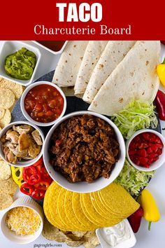 taco bar with tortilla chips, salsa and guacamole on the side